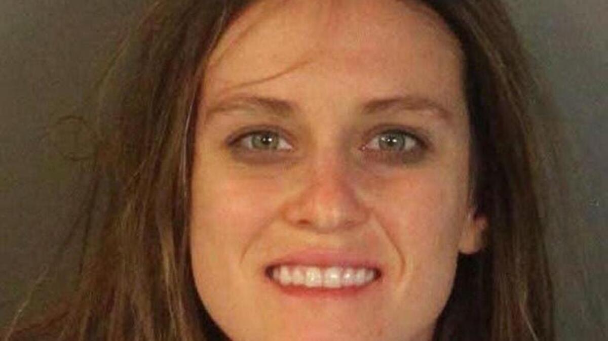 Lindsay Frasher, 28, tried to physically take a 3-year-old away from an unidentified grandfather visiting Ashford Park with his two grandchildren, said Sgt. Gary Hopping of the Auburn Police Department.