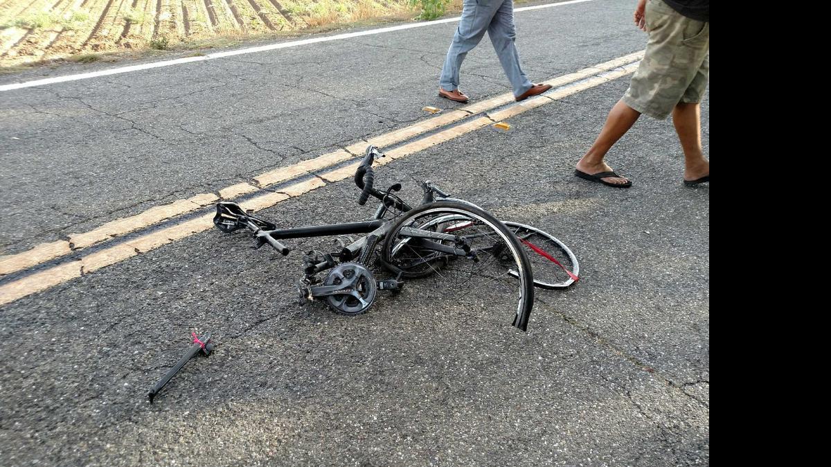 
Jonathan Jackson’s bike lies on the road after the 17-year-old cyclist was struck by a car Tuesday.
