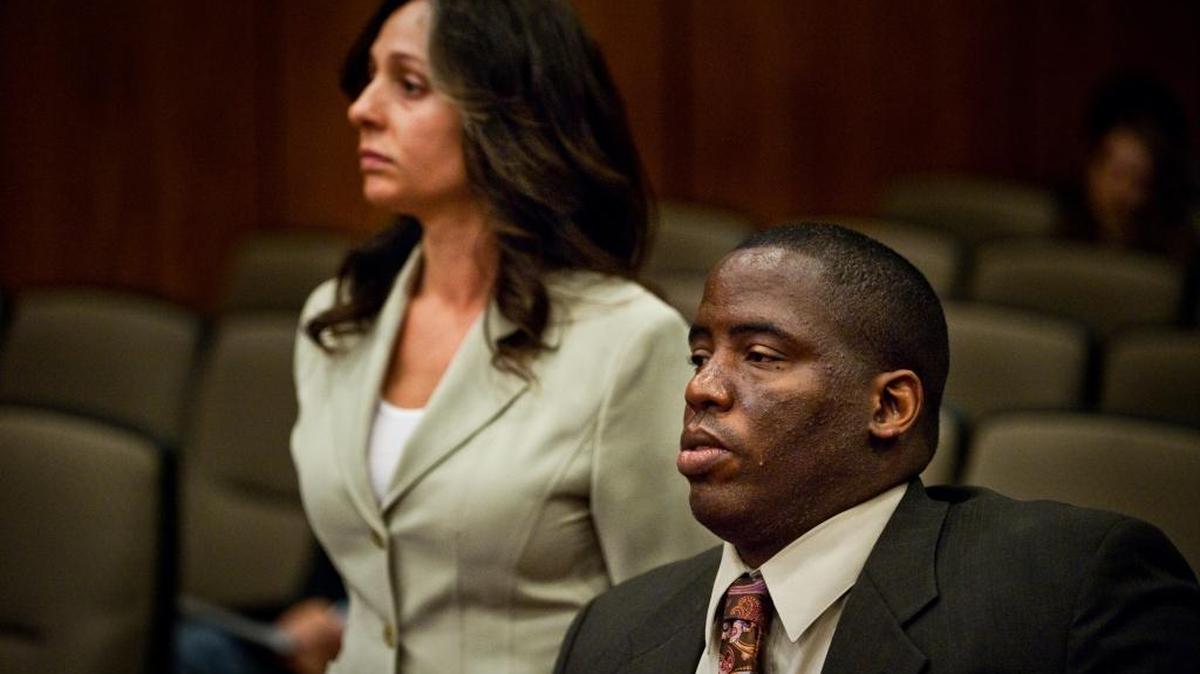 John Smiley and wife Cynthia Ann Biasi-Smiley at their court arraignment, March 23, 2010