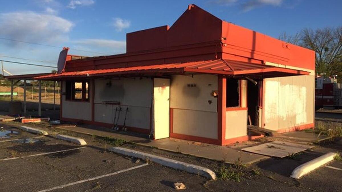 An abandoned building at Florin Road and Kara Drive in south Sacramento County was damaged by a fire that officials say was accidentally started by homeless people staying at the site.
