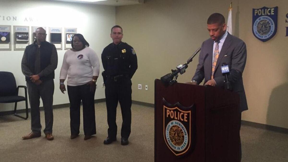 Sacramento Mayor Kevin Johnson speaks before police Chief Sam Somers (nearest Johnson) announces the arrest of Keymontae Lindsey, 16, on suspicion of killing Grant High football plater Jaulon Clavo on Nov. 13, 2015.