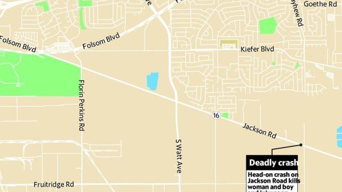 A woman and boy were killed in an early-morning crash on Jackson Road on Monday.