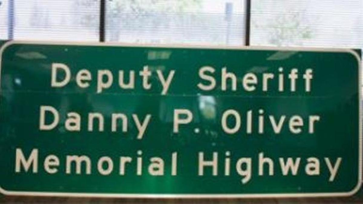 A road sign will be placed on Highway 50 in Cameron Park to honor Sacramento County Sheriff’s Deputy Danny Oliver, who was killed in the line of duty three years ago.