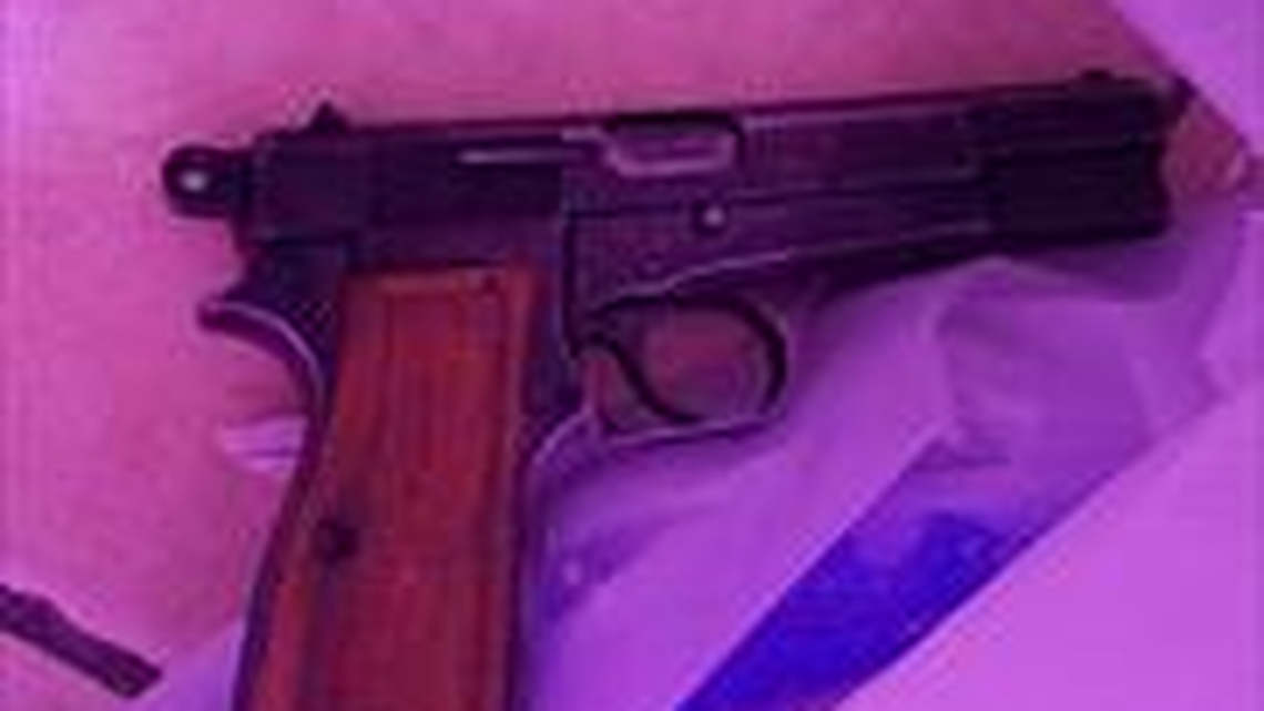A gun displayed by the suspect who was holed up Monday night in a south Sacramento residence.