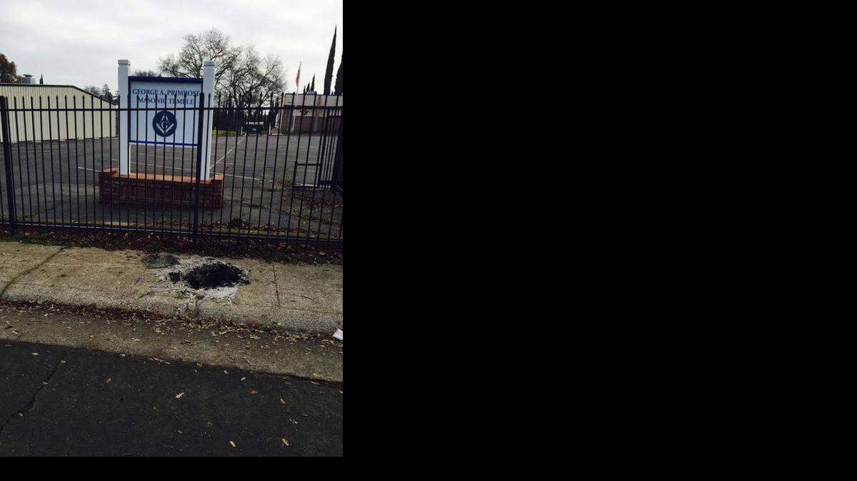
Fire debris marks where a dog was burned in a crate on Becerra Way.

