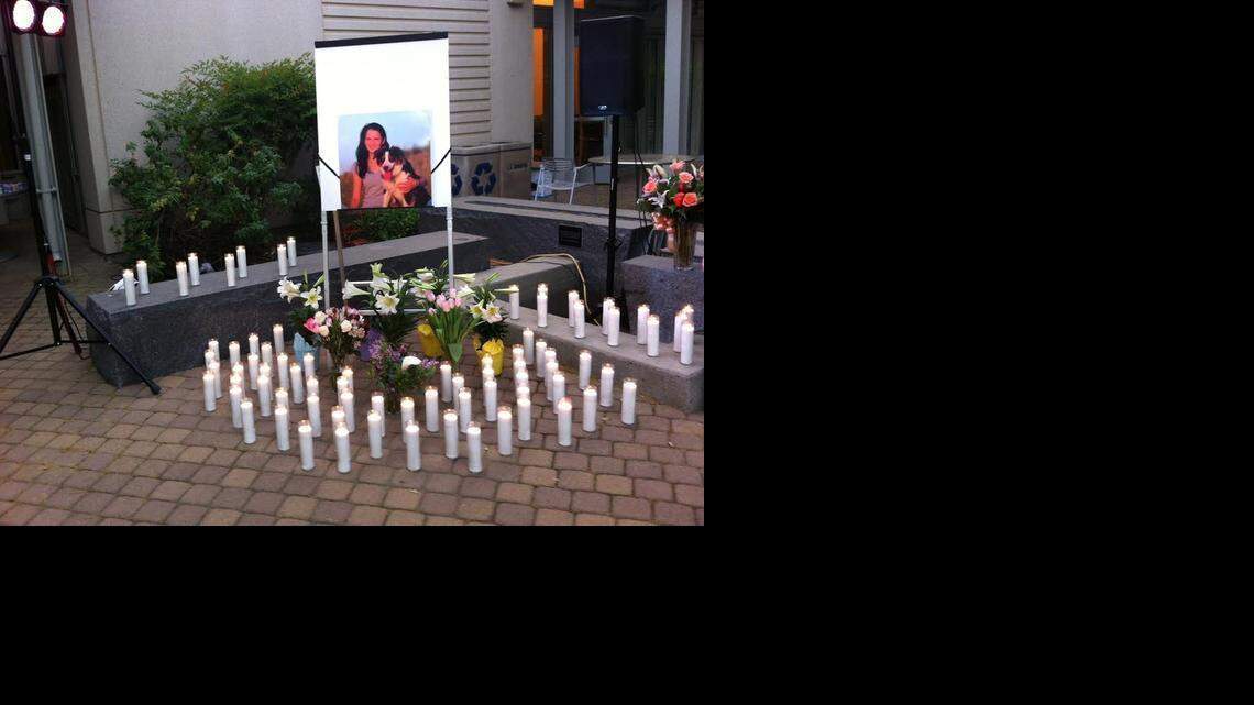 
Candles were placed in a patio in front of Gladys Valley Hall, part of UC Davis’ veterinary teaching compound, at the vigil Saturday night for Whitney Engler.
