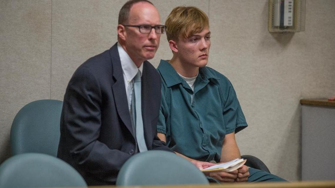 
Attorney William Dittmann sits with his client, Nolen Buchanan, 16, who is accused of fatally shooting three family members who were found burned in a Greenwood cabin. Buchanan appeared in El Dorado Superior Court on Monday afternoon, Oct. 5, 2015.
