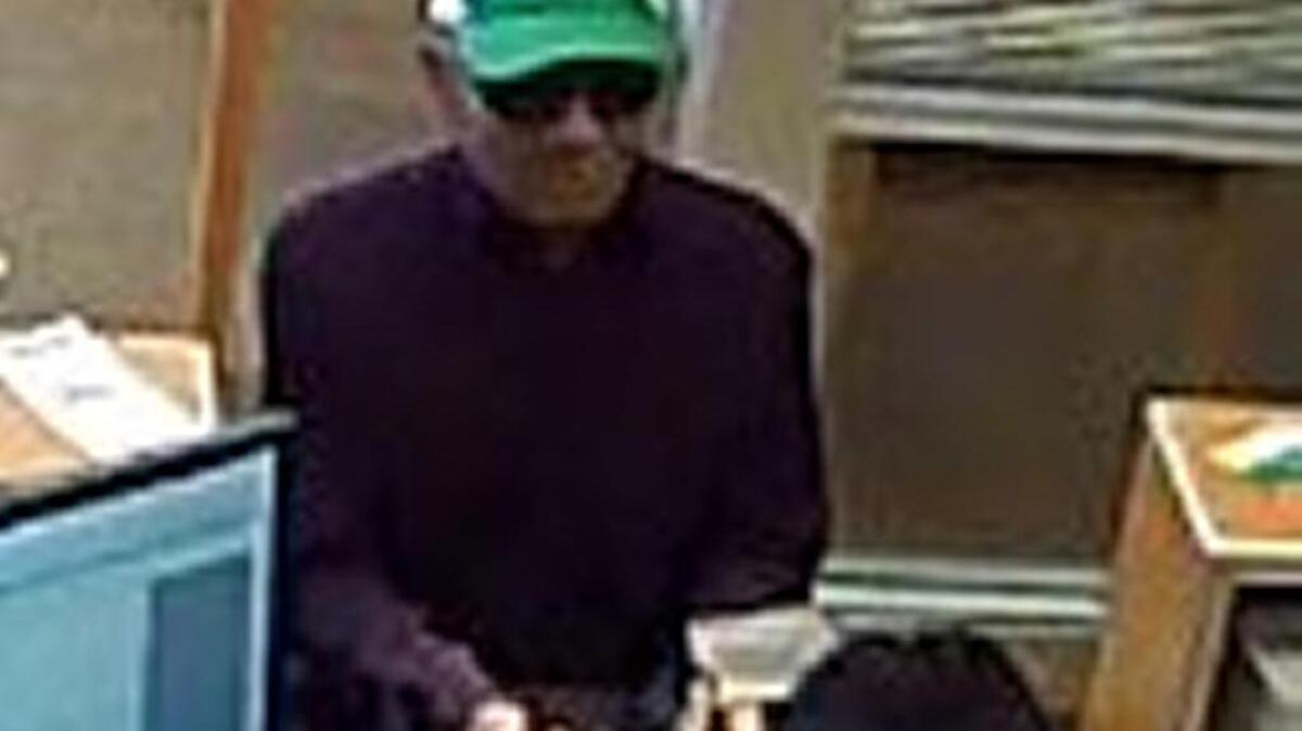 A surveillance photo shows a man sought in the robbery of Schools Credit Union in Elk Grove.