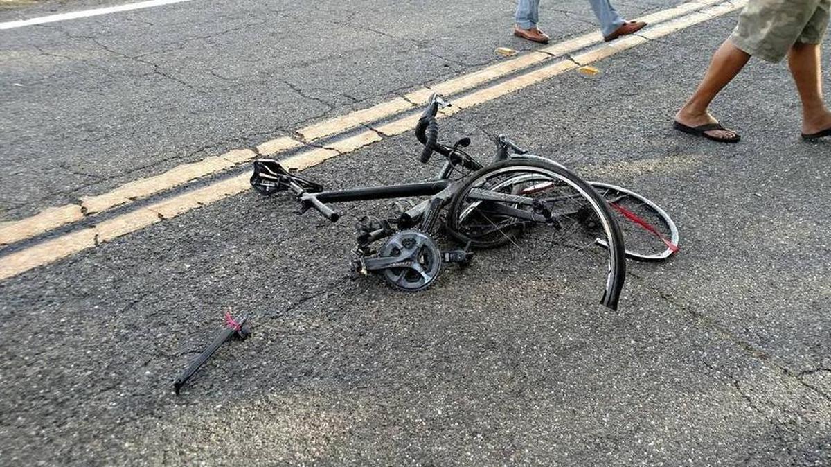 Jonathan Jackson’s bike lies on the road after the 17-year-old cyclist was struck by an SUV on June 30, 2015. Alamar Cyril Houston is accused of being the driver and is on trial in the incident.