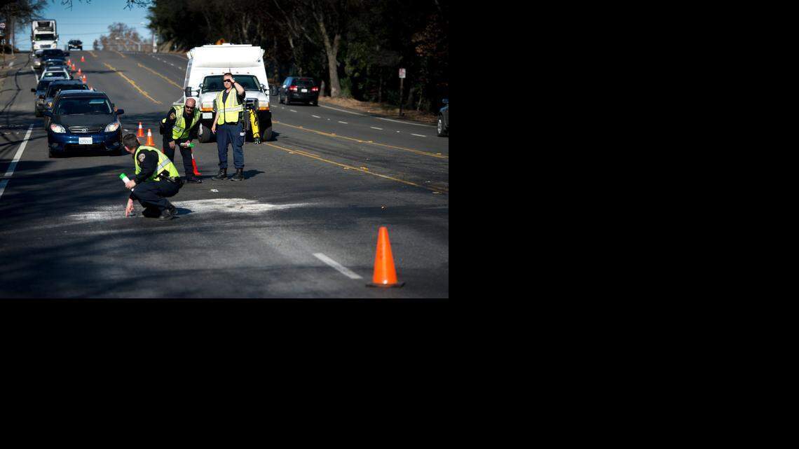 
CHP officers investigate where a Buick LeSabre and a Subaru Outback crashed head-on and the Buick burst into flames early Friday. Four occupants of the Buick died; one woman was hospitalized in critical condition. The Subaru driver is reported in serious condition.
