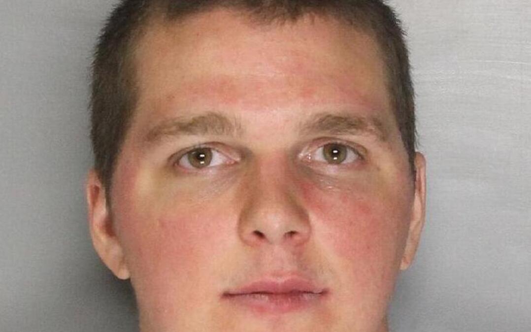 Robert Kamber, 24, was arrested when officers found him naked in the doorway of an apartment housing a honey oil lab.