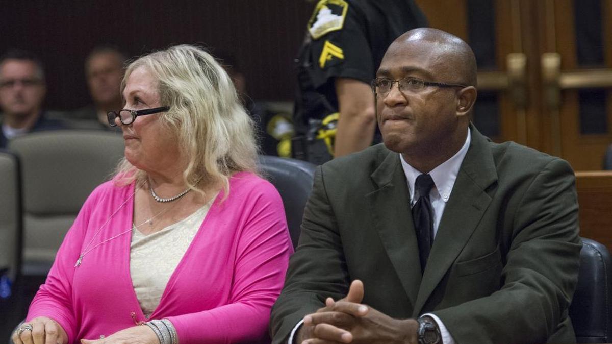 
Attorney Linda Parisi, listening to jurors verify their convictions of her client Gary Dale Baker, has been fired by Baker.
