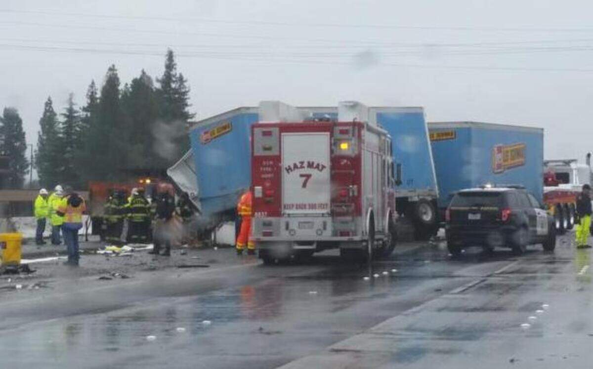 
Crews work to clear a jackknifed big rig from Interstate 5 in south Sacramento. The crash has caused traffic problems since late Tuesday morning.
