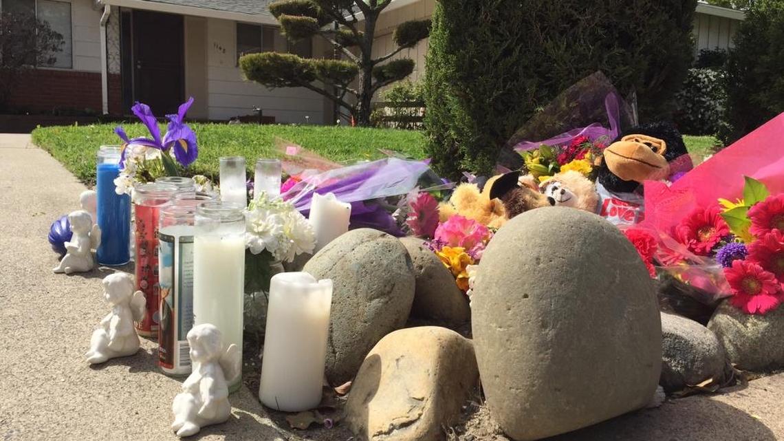 Once crime tape was removed Sunday, a memorial quickly went up near the scene of a quadruple homicide on 35th Avenue in Sacramento.