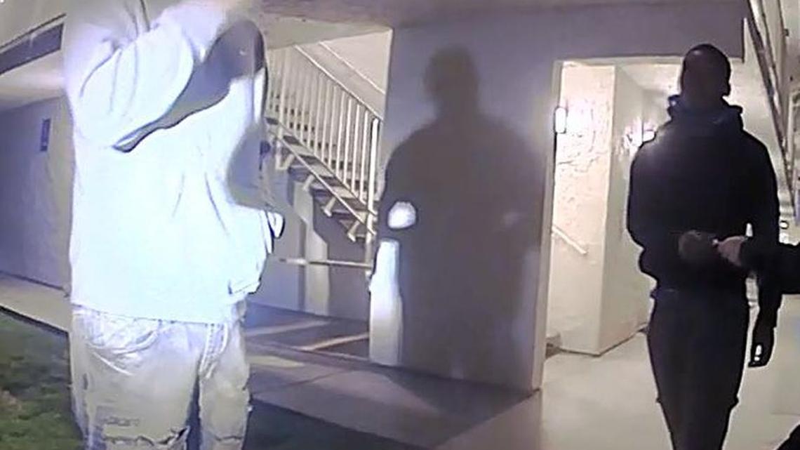 Austin Cody Hughes, 21, and Demarco Marquis Rowe, 19, are pictured in the area of the Motel 6 in Davis, where they were arrested.