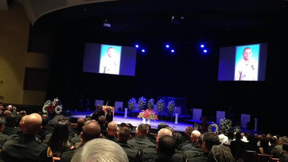 
Mourners file into the funeral services Thursday for Carlos Diamond Francies.
