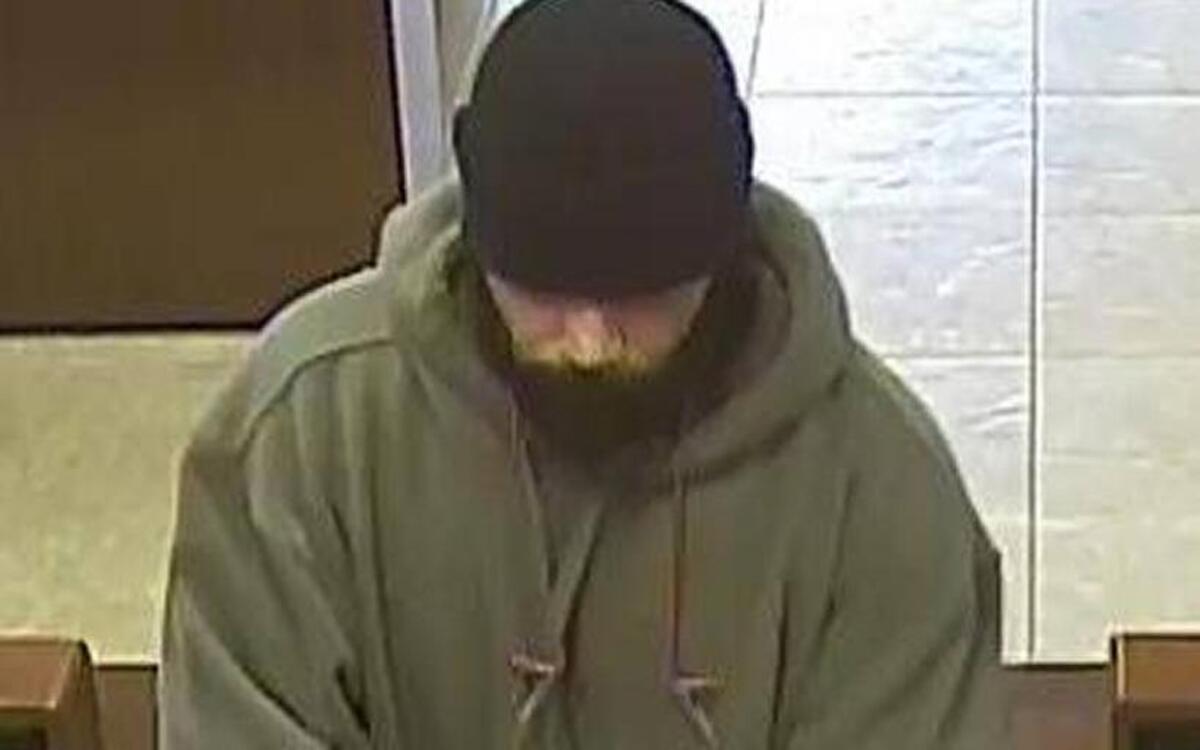 A surveillance photo shows a man sought in the robbery of a Chase Bank in Granite Bay.