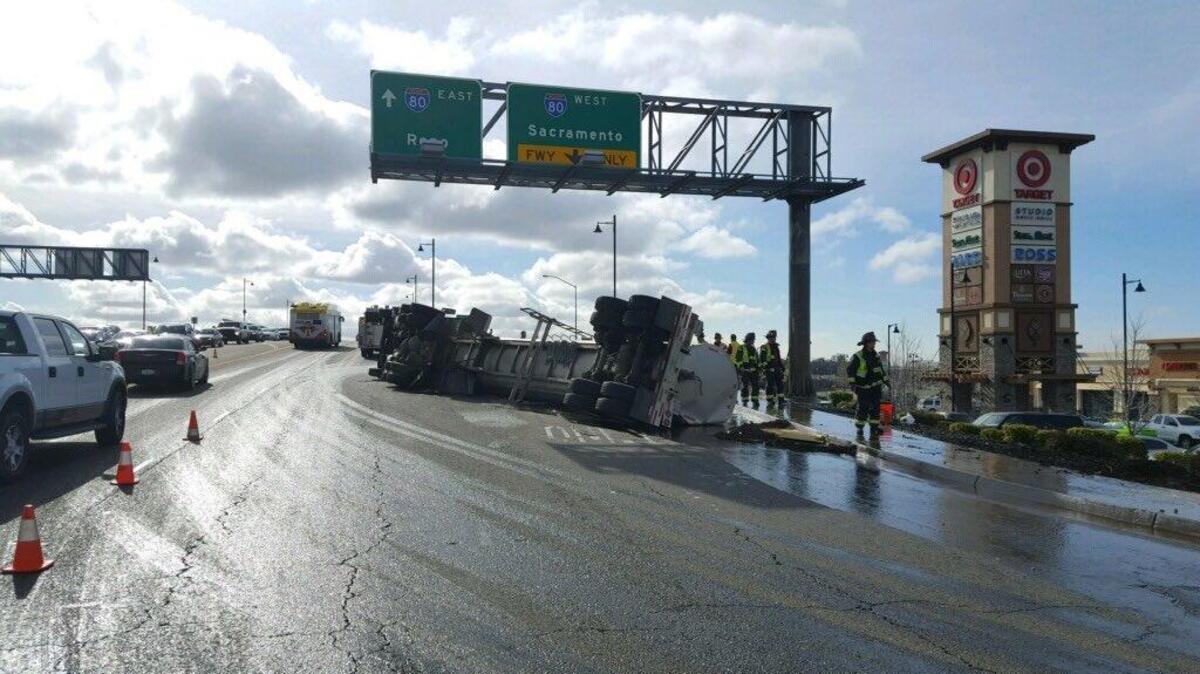 A tanker truck rolled over and spilled cooking oil Thursday morning at the westbound onramp to Sierra College Boulevard.
