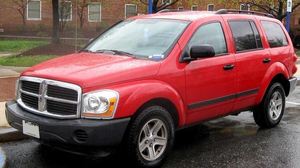 Sheriff’s officials say a man suspected of robbing a Georgetown bank was seen driving away in a Dodge Durango similar to the one pictured.