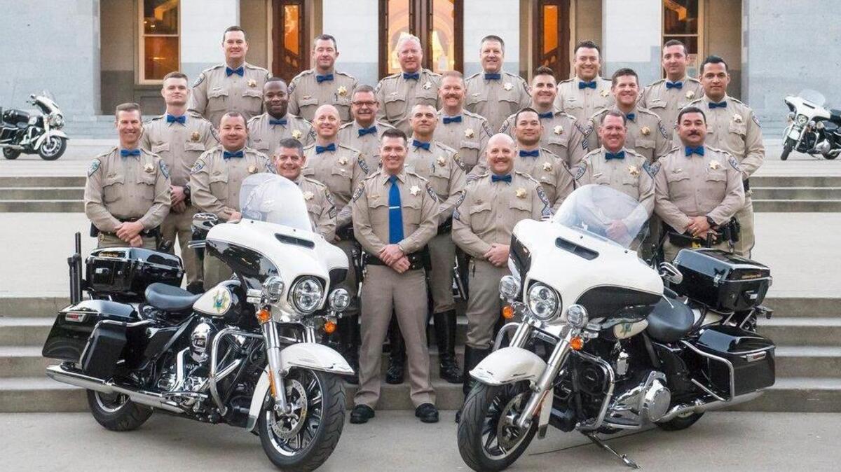 Officer Michael Ericson (second from right, second row from bottom) is shown with fellow members of the North Sacramento CHP Motor Squad.