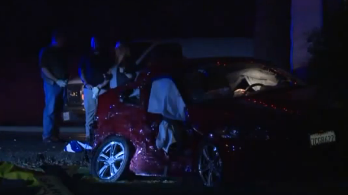 This red Honda was southbound on Garfield in the left-turn lane. As it was turning from Garfield onto Kiva it was hit broadside by the Lexus.