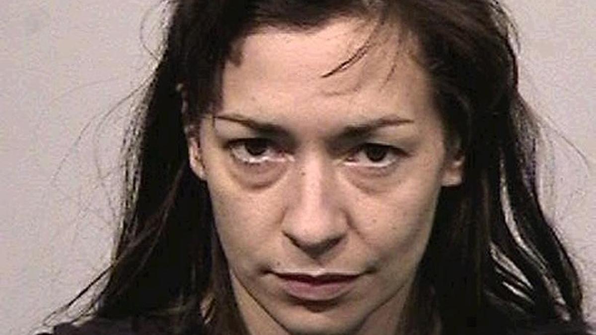 Suspect Hannah Ashley is described as age 35, female, white skin, with brown hair and brown eyes, 5 feet 6 inches tall and weighing 125 pounds.