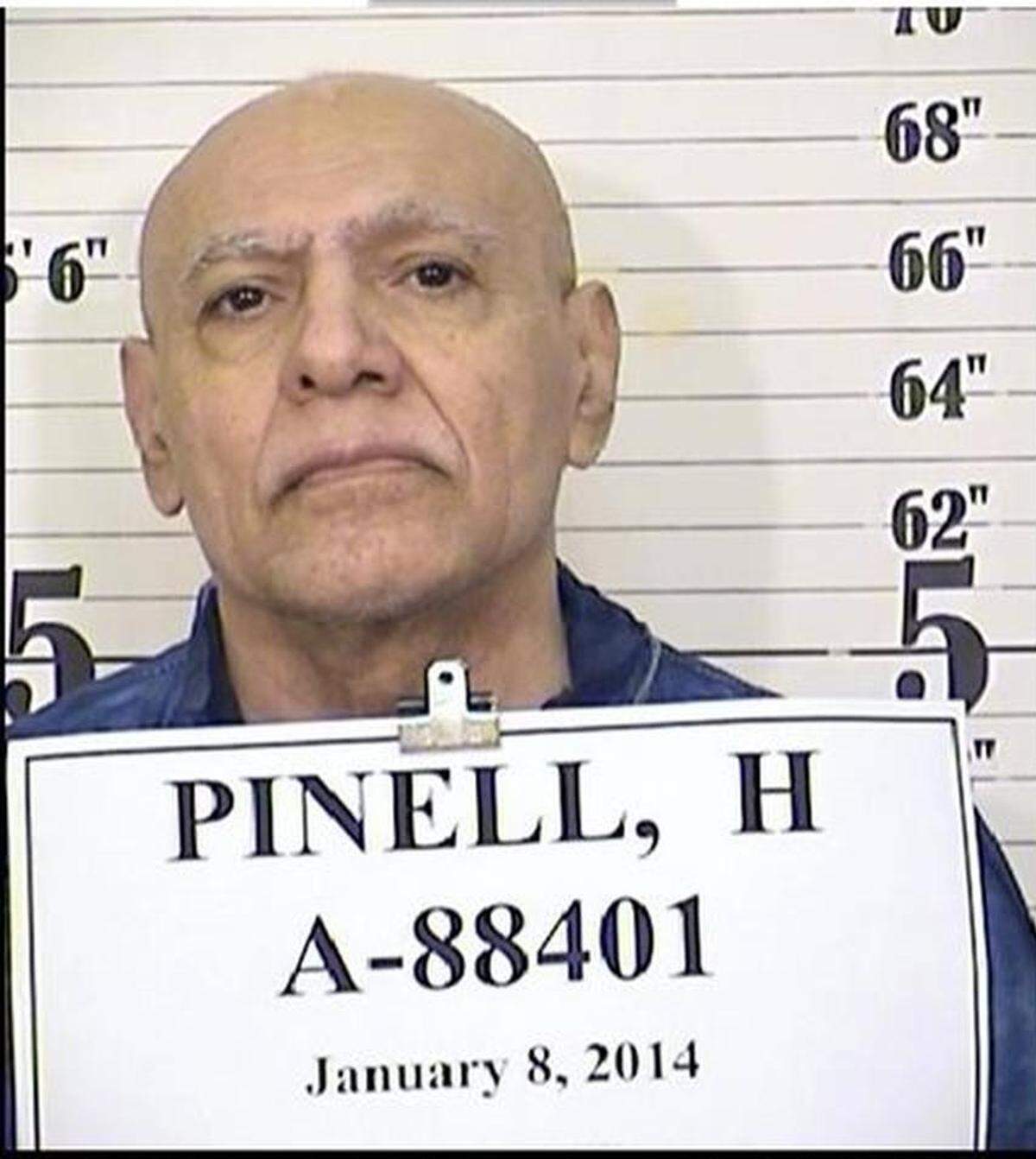 This Jan. 8, 2014, file photo, from the California Department of Corrections and Rehabilitation shows inmate Hugo Pinell. Two convicted killers were charged with murder Tuesday, Dec. 8, 2015, in the August slaying of Pinell, a notorious California inmate, just days after he was released into the general prison population.