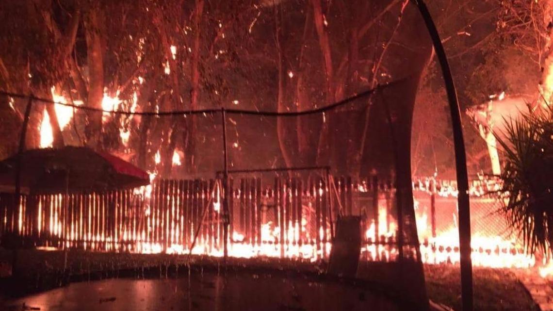 The Burlington Way blaze singed fences and a shed.