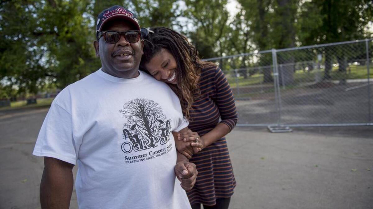 Oak Park resident, social justice and community advocate Kevin Carter and Tamika L’Ecluse, President of Oak Park Neighborhood Association discuss their shared goals of improving their neighborhood while fellow community members rallied Wednesday evening to advocate for improved safety in their Oak Park community following a Tuesday night shooting that erupted near youngsters participating in Little League games at McClatchy Park. “Something like this was bound to happen yesterday when there’s systemic economic and social issues,” he said.