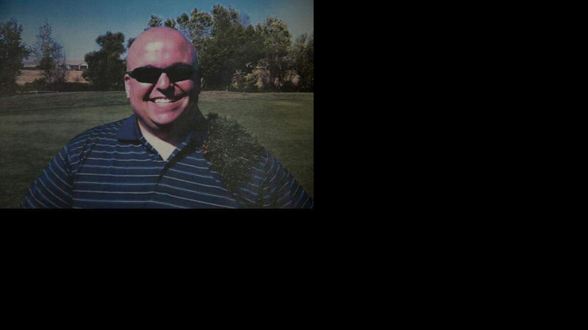 
A photo from the last golf tournament slain deputy Danny Oliver attended was handed out by his family on Monday, October, 27, 2014 in Sacramento, Calif.
