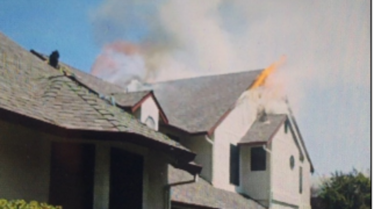 Firefighters called a second alarm after arriving to find flames coming from the attic of a townhouse on Olivebranch Lane in Carmichael.