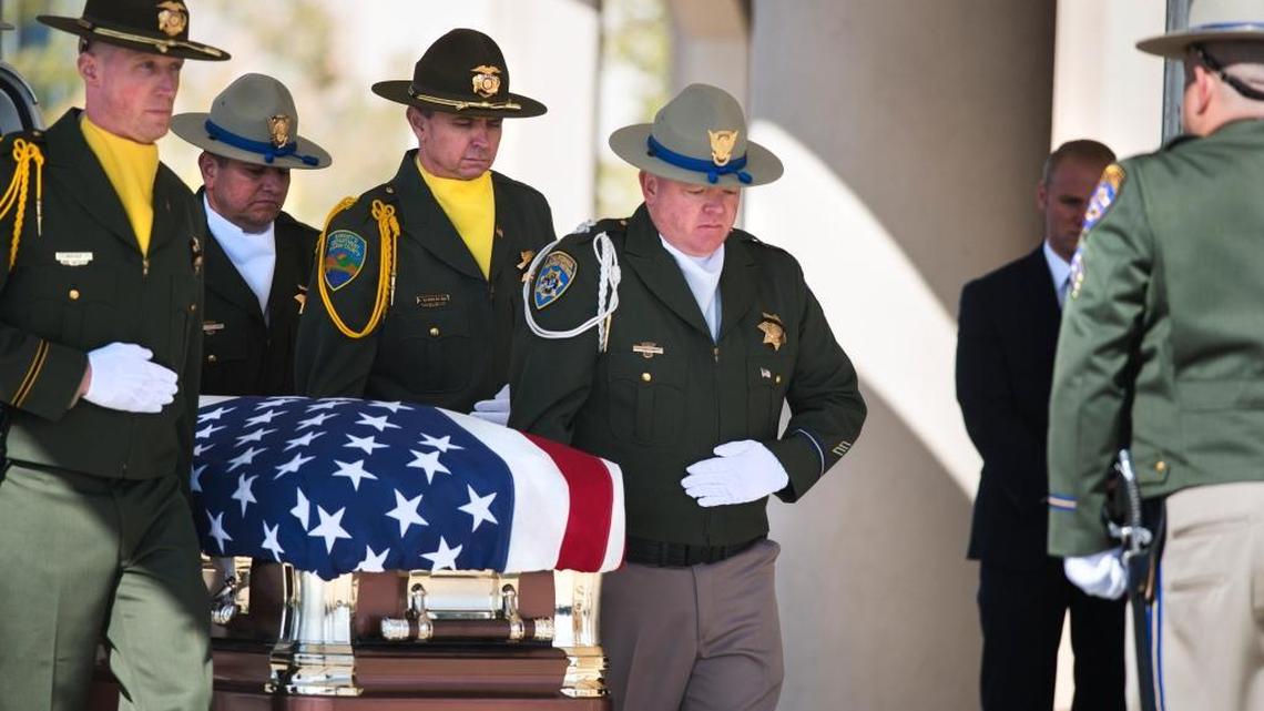 The casket containing the body of CHP Officer Lucas Chellew is carried out of a hearse and into Adventure Christian Church in Roseville before his funeral service on March 4. Chellew was killed in a motorcycle crash while in the line of duty on Feb. 22.