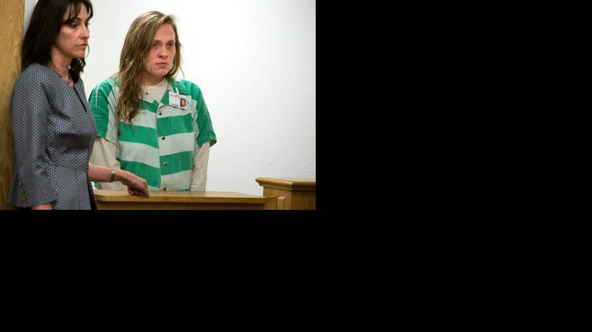 
Tracie Olson, Yolo County public defender, stands with Samantha Green, the mother of 3-week-old Justice Rees, as she is arraigned last week in the child’s death . Green pleaded not guilty to felony charges of involuntary manslaughter and abusing or endangering the health of a child.
