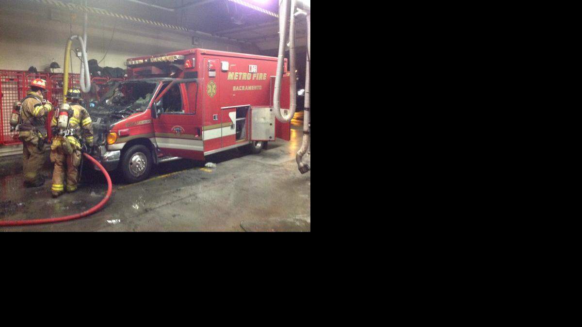 
Firefighters look over burned ambulance at Antelope’s Station 25
