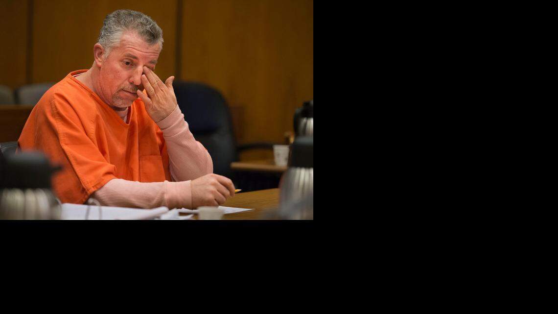 
William Meek wipes a tear from his eye while he listens to his former girlfriend, Mollie Wasemiller, testify during a preliminary hearing on Friday, Feb. 20, 2015, in Sacramento, Calif. Meek is accused of drowning his girlfriend's dog Zelda, a 12-year-old border collie, by tying a bowling ball around her neck and throwing her into the American River.
