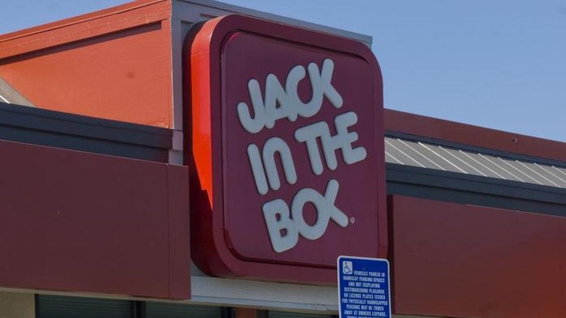 Unlike these customers at a Sacramento outlet in 2009, a man in Stockton found another way inside a Jack-in-the-Box eatery – through the drive-through window.