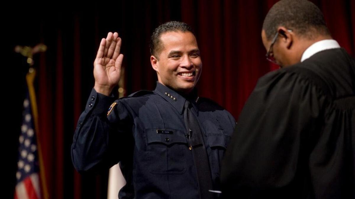 Daniel Hahn is sworn in as chief of the Roseville Police Department by Sacramento County Superior Court Judge Troy Nunley at the Roseville Theater in 2011.