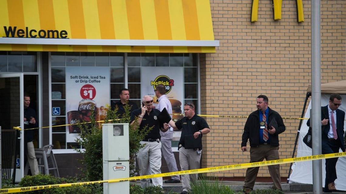 Investigators at the scene of an officer-related shooting that occurred in a McDonald’s parking lot on Tuesday, Oct. 25, 2016, in Lincoln, Calif.