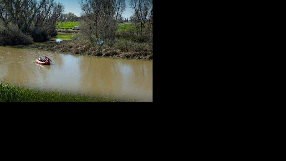 Yolo County investigators check the Ridge Cut Slough after the lifeless body of 20-day-old Justice Rees was found Wednesday morning. The baby’s distraught mother, Samantha Green, was found near the slough Tuesday afternoon. Both had been missing since Saturday.