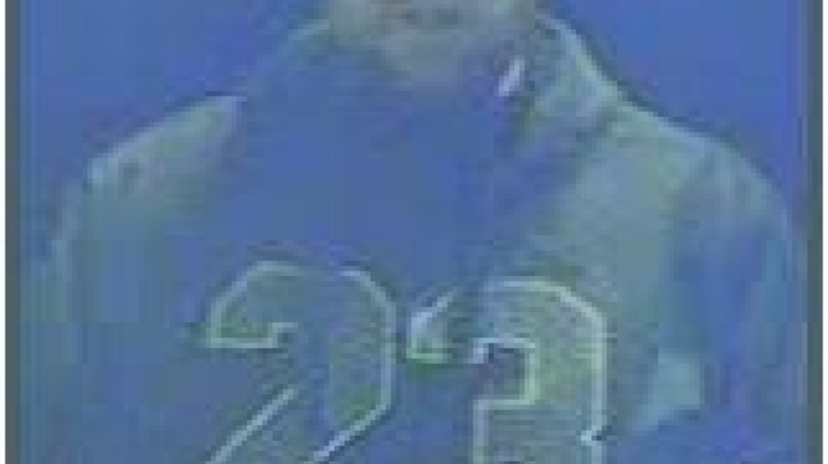 A surveillance photo shows a man suspected of fraudulent credit card transactions.