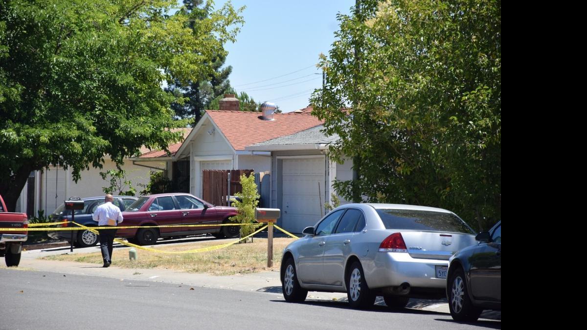 
Investigators on Sunday work at the scene of a shooting at Burline and Lyra streets in Rancho Cordova.
