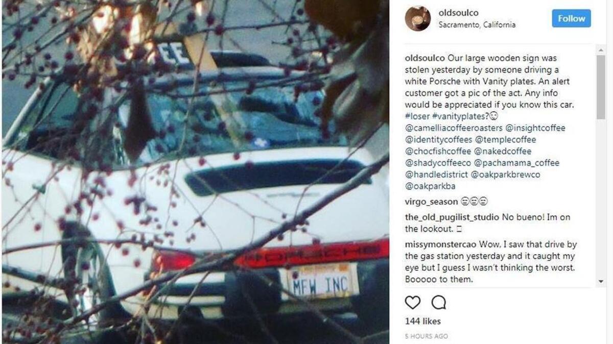 A customer snapped a photo of a sign stolen from Old Soul Co. in midtown Sacramento the back of a white Porsche with vanity plates on Nov. 30, 2017.