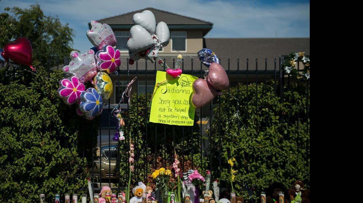 
A memorial for Jadianna Larsen rises in front of the housing complex run by Mercy Housing California in Sacramento where the 6-year-old had been living. . Her body was found on Thursday in Glenn County.
