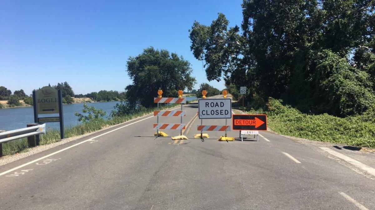 A levee washout led to the closure of South River Road, between County Roads 141 and 142, near Clarksburg on Tuesday, July 11, 2017.