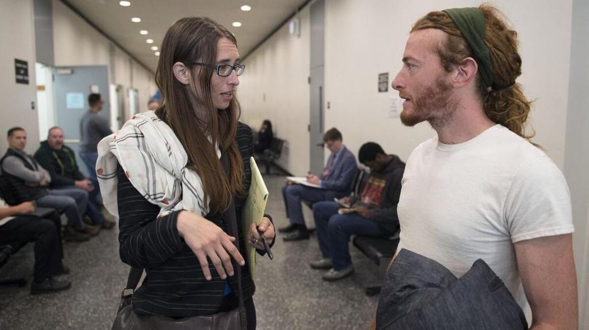 Sean Thompson, who hit Mayor Kevin Johnson in the face with a pie talks to his lawyer, Claire White, after he appeared briefly in Sacramento Superior Court on Oct. 20, 2016 in Sacramento.