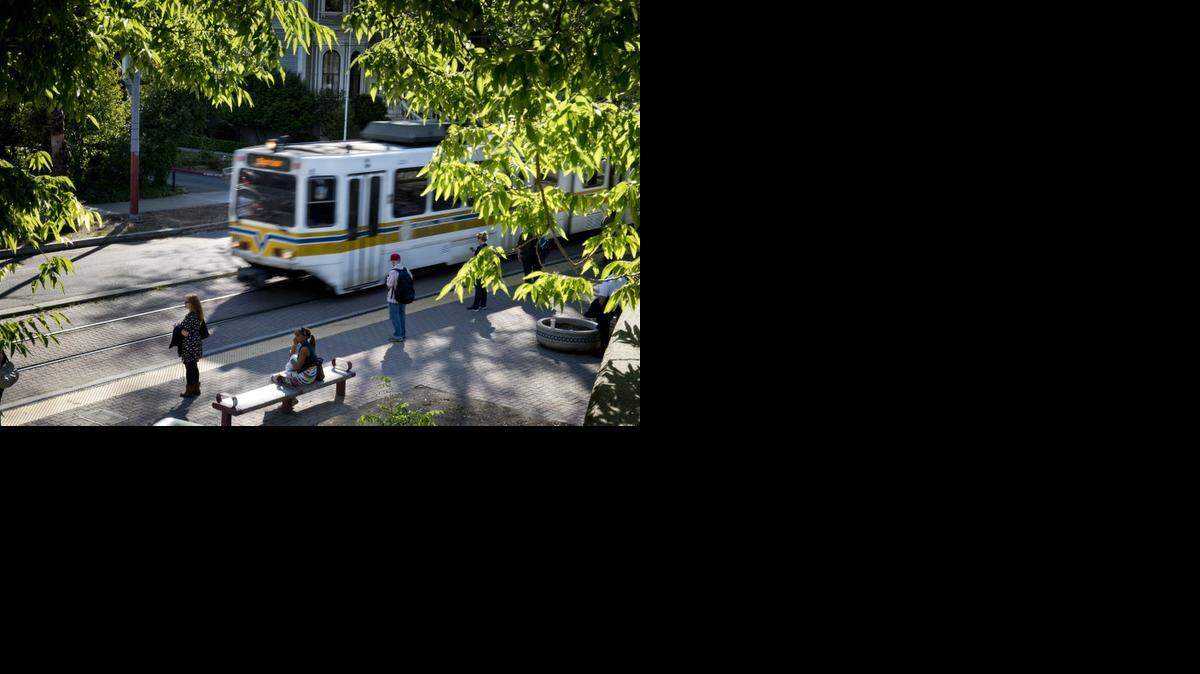 
Riders of regional transit board a train at the 8th Street and O Street station on Tuesday, April 10, 2014.
