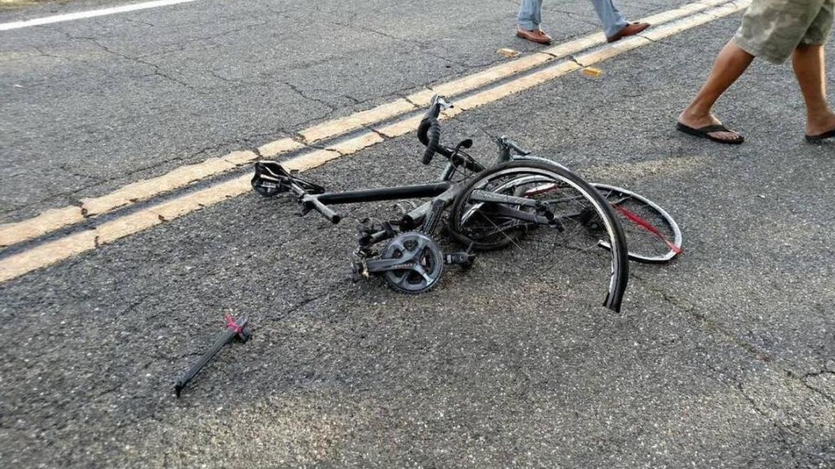 Jonathan Jackson’s bike lies on the road after the 17-year-old cyclist was struck by a car. Alamar Cyril Houston is accused of deliberately striking a group of cyclists.