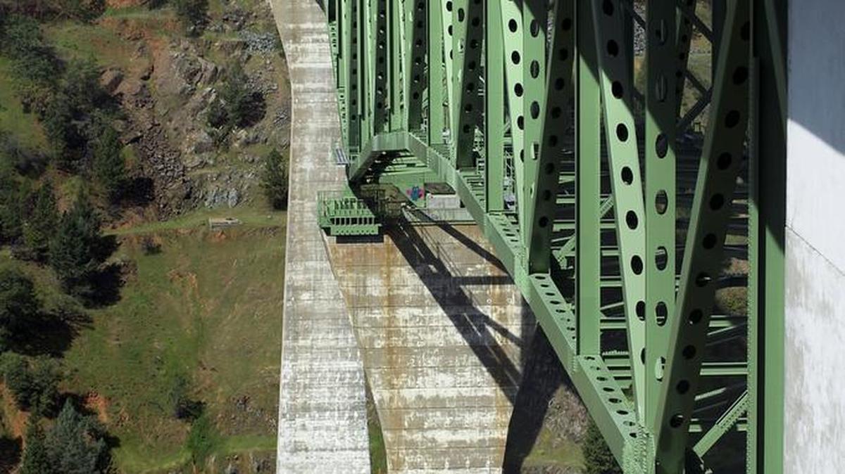 The Foresthill Bridge is the tallest bridge in California at 730 feet and spans the north fork of the American River near Auburn. Despite the installation of taller railings, people are still committing suicide in high numbers at the bridge.