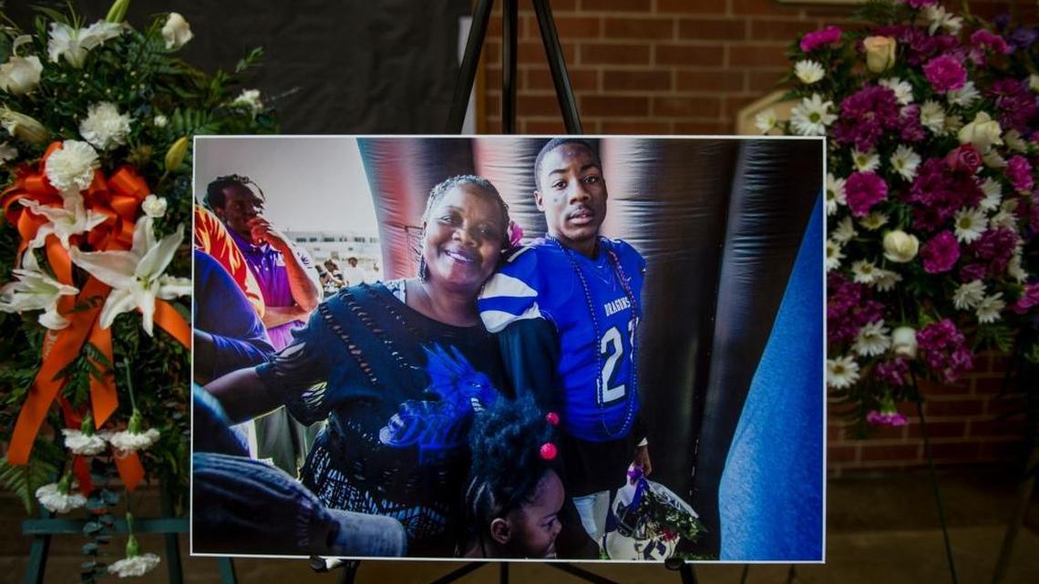 Tanya Garrett, mother of Deston Garrett, is pictured with her son at a repass to celebrate his life at Sacramento Charter High School on June 24. The suspect in Garrett’s death, 23-year-old Fredrick Marshall, was in court Monday to face manslaughter charges.