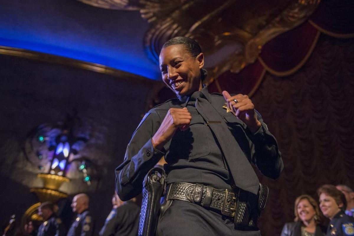 Sacramento police Sgt. Sabrina Briggs celebrates with her fellow officers after the department’s promotions ceremony at the Crest Theatre on Friday, December 1, 2017. Briggs is the first African-American woman to be promoted to sergeant in the Sacramento Police Department.